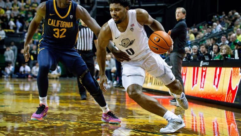 Oregon guard Kario Oquendo drives toward the basket as the Oregon Ducks host the California Golden Bears Saturday, Jan. 13, 2024 at Matthew Knight Arena in Eugene, Ore.