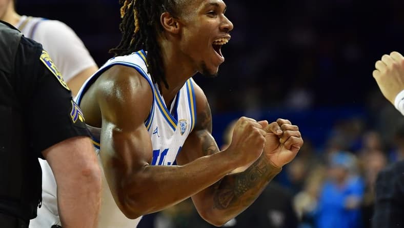 January 14, 2024; Los Angeles, California, USA; UCLA Bruins guard Dylan Andrews (2) celebrates the victory against the Washington Huskies at Pauley Pavilion. Mandatory Credit: Gary A. Vasquez-USA TODAY Sports