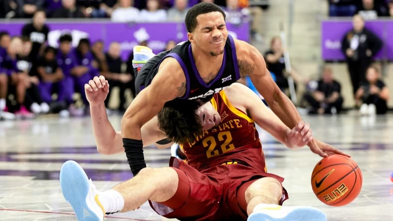 Jan 20, 2024; Fort Worth, Texas, USA;  TCU Horned Frogs guard Jameer Nelson Jr. (4) and Iowa State Cyclones forward Milan Momcilovic (22) go for a loose ball during the second half at Ed and Rae Schollmaier Arena. Mandatory Credit: Kevin Jairaj-USA TODAY Sports