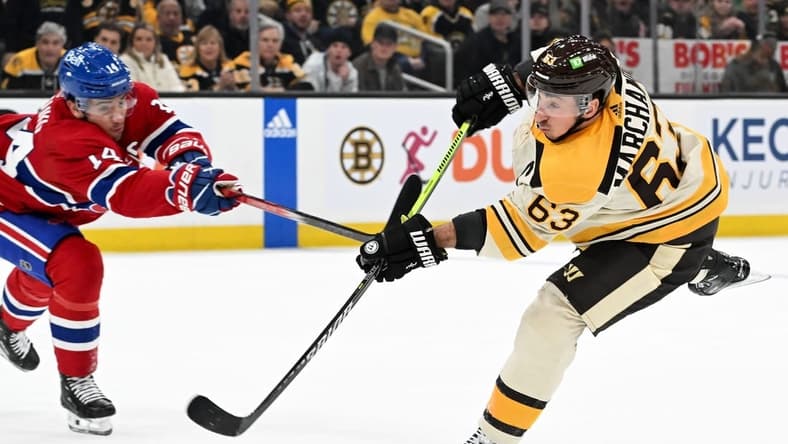 Jan 20, 2024; Boston, Massachusetts, USA; Boston Bruins left wing Brad Marchand (63) takes a shot against the Montreal Canadiens during the first period at the TD Garden. Mandatory Credit: Brian Fluharty-USA TODAY Sports