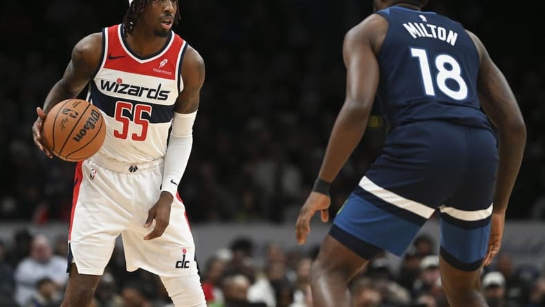 Jan 24, 2024; Washington, District of Columbia, USA; Washington Wizards guard Delon Wright (55) looks to pass as Minnesota Timberwolves guard Shake Milton (18) defends during the second half at Capital One Arena. Mandatory Credit: Tommy Gilligan-USA TODAY Sports