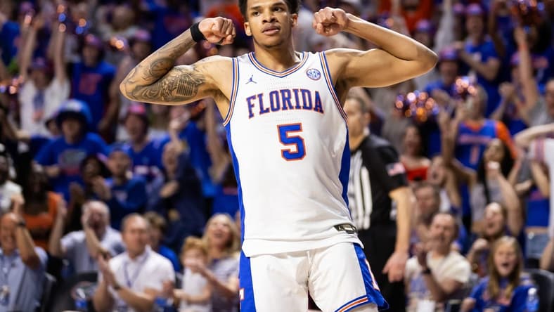 Jan 27, 2024; Gainesville, Florida, USA; Florida Gators guard Will Richard (5) gestures after a score against the Georgia Bulldogs during the second half at Exactech Arena at the Stephen C. O'Connell Center. Mandatory Credit: Matt Pendleton-USA TODAY Sports