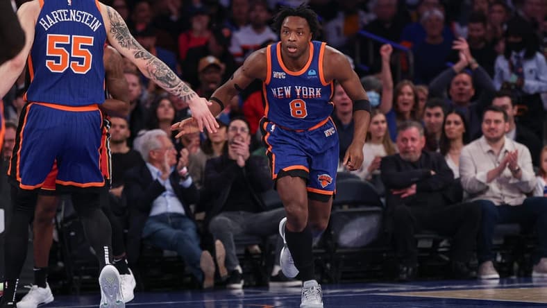 Jan 27, 2024; New York, New York, USA; New York Knicks forward OG Anunoby (8) slaps hands with center Isaiah Hartenstein (55) after a basket against the Miami Heat during the first half at Madison Square Garden. Mandatory Credit: Vincent Carchietta-USA TODAY Sports