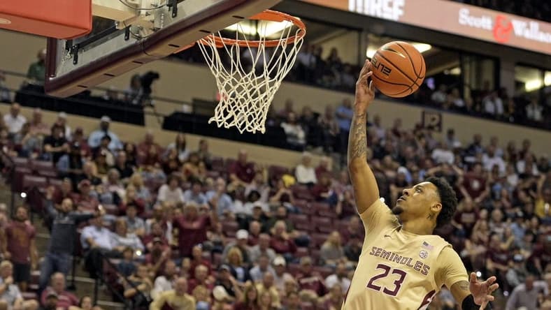 Jan 27, 2024; Tallahassee, Florida, USA; Florida State Seminoles guard Primo Spears (23) shoots the ball against the North Carolina Tarheels during the first half at Donald L. Tucker Center. Mandatory Credit: Melina Myers-USA TODAY Sports