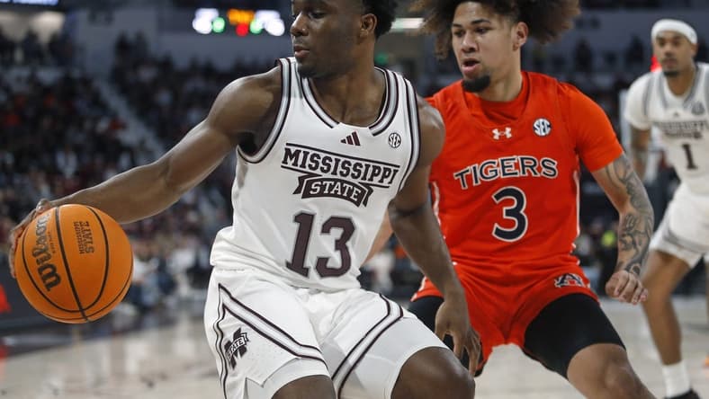 Jan 27, 2024; Starkville, Mississippi, USA; Mississippi State Bulldogs guard Josh Hubbard (13) dribbles as Auburn Tigers guard Tre Donaldson (3) defends during the second half at Humphrey Coliseum. Mandatory Credit: Petre Thomas-USA TODAY Sports