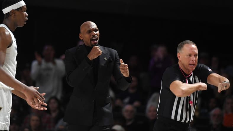 Jan 27, 2024; Nashville, Tennessee, USA; Vanderbilt Commodores head coach Jerry Stackhouse reacts after a Tennessee Volunteers turnover during the first half at Memorial Gymnasium. Mandatory Credit: Christopher Hanewinckel-USA TODAY Sports
