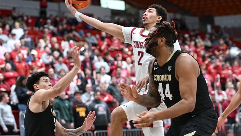 Jan 27, 2024; Pullman, Washington, USA; Washington State Cougars guard Myles Rice (2) shoots the ball against Colorado Buffaloes center Eddie Lampkin Jr. (44) in the second half at Friel Court at Beasley Coliseum. Mandatory Credit: James Snook-USA TODAY Sports