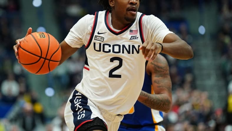 Jan 28, 2024; Hartford, Connecticut, USA; UConn Huskies guard Tristen Newton (2) drives the ball against the Xavier Musketeers in the first half at XL Center. Mandatory Credit: David Butler II-USA TODAY Sports