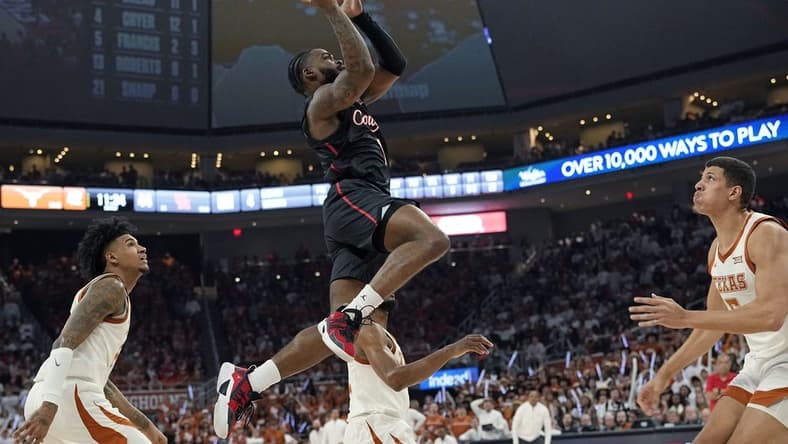 Jan 29, 2024; Austin, Texas, USA; Houston Cougars guard Jamal Shead (1) drives to the basket during the second half against the Texas Longhorns at Moody Center. Mandatory Credit: Scott Wachter-USA TODAY Sports