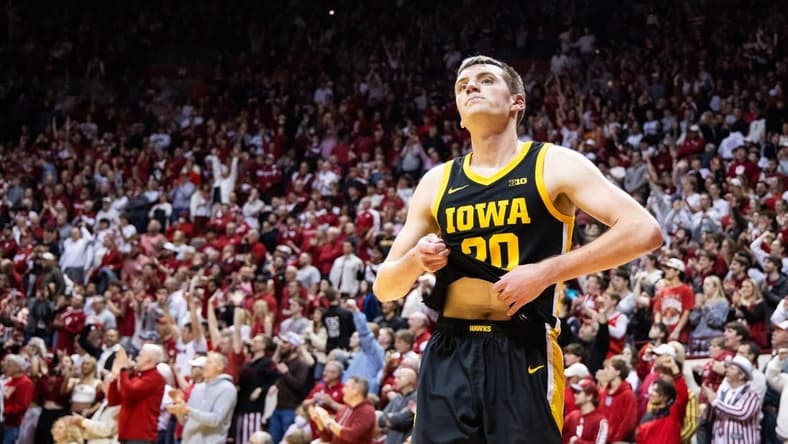Jan 30, 2024; Bloomington, Indiana, USA; Iowa Hawkeyes forward Payton Sandfort (20) reacts to the loss against the Indiana Hoosiers  at Simon Skjodt Assembly Hall. Mandatory Credit: Trevor Ruszkowski-USA TODAY Sports