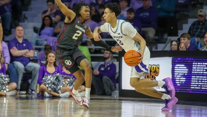 Jan 30, 2024; Manhattan, Kansas, USA; Kansas State Wildcats guard Dorian Finister (3) dribbles against Oklahoma Sooners guard Javian McCollum (2) during the second half at Bramlage Coliseum. Mandatory Credit: Scott Sewell-USA TODAY Sports