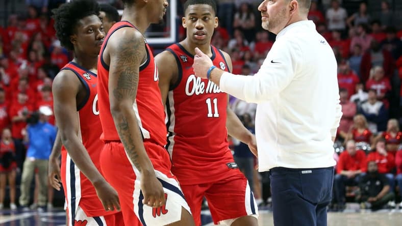 Jan 30, 2024; Oxford, Mississippi, USA; Mississippi Rebels head coach Chris Beard huddles his team near the end of the second half against the Mississippi State Bulldogs at The Sandy and John Black Pavilion at Ole Miss. Mandatory Credit: Petre Thomas-USA TODAY Sports