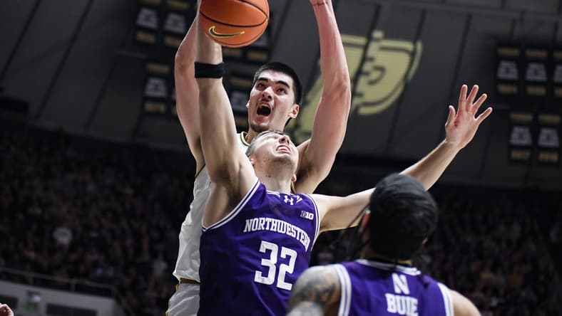 Jan 31, 2024; West Lafayette, Indiana, USA; Purdue Boilermakers center Zach Edey (15) dunks the ball on Northwestern Wildcats forward Blake Preston (32) during the second half at Mackey Arena. Mandatory Credit: Robert Goddin-USA TODAY Sports