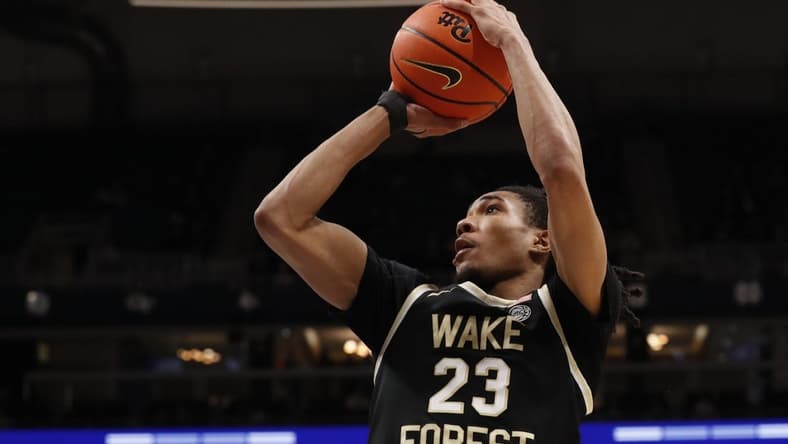 Jan 31, 2024; Pittsburgh, Pennsylvania, USA; Wake Forest Demon Deacons guard Hunter Sallis (23) shoots against the Pittsburgh Panthers during the second half at the Petersen Events Center. Pittsburgh won 77-72. Mandatory Credit: Charles LeClaire-USA TODAY Sports