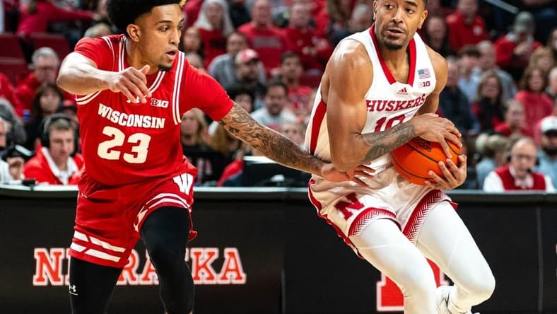 Feb 1, 2024; Lincoln, Nebraska, USA; Nebraska Cornhuskers guard Jamarques Lawrence (10) drives against Wisconsin Badgers guard Chucky Hepburn (23) during the first half at Pinnacle Bank Arena. Mandatory Credit: Dylan Widger-USA TODAY Sports
