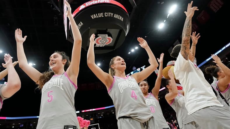 Feb 1, 2024; Columbus, OH, USA; Ohio State Buckeyes guard Emma Shumate (5) and guard Jacy Sheldon (4) sing    Carmen Ohio    following their 87-49 win over the Wisconsin Badgers in the NCAA women   s basketball game at Value City Arena.