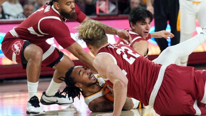Feb 1, 2024; Tempe, Arizona, USA; Arizona State Sun Devils guard Frankie Collins (1) protects the ball from Stanford Cardinal forward James Keefe (22) and Stanford Cardinal guard Jared Bynum (1) during the first half at Desert Financial Arena. Mandatory Credit: Joe Camporeale-USA TODAY Sports