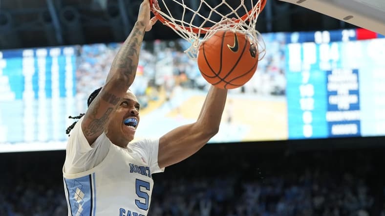 Feb 3, 2024; Chapel Hill, North Carolina, USA;  North Carolina Tar Heels forward Armando Bacot (5) scores in the second half at Dean E. Smith Center. Mandatory Credit: Bob Donnan-USA TODAY Sports