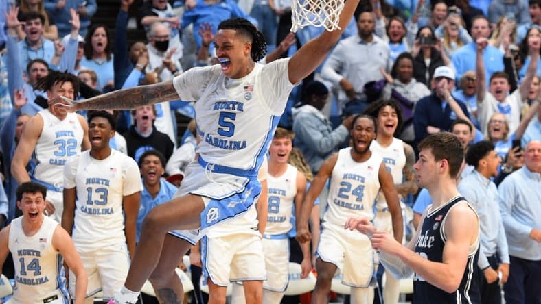 Feb 3, 2024; Chapel Hill, North Carolina, USA; North Carolina Tar Heels forward Armando Bacot (5) scores in the second half at Dean E. Smith Center. Mandatory Credit: Bob Donnan-USA TODAY Sports