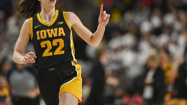 Feb 3, 2024; College Park, Maryland, USA;  Iowa Hawkeyes guard Caitlin Clark (22) reacts after making a three point basket during the second half against the Maryland Terrapins at Xfinity Center. Mandatory Credit: Tommy Gilligan-USA TODAY Sports