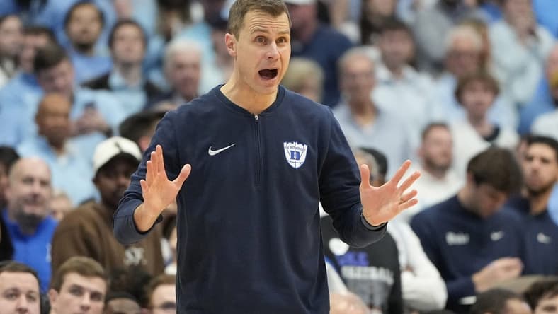 Feb 3, 2024; Chapel Hill, North Carolina, USA;  Duke Blue Devils head coach Jon Scheyer reacts in the second half at Dean E. Smith Center. Mandatory Credit: Bob Donnan-USA TODAY Sports
