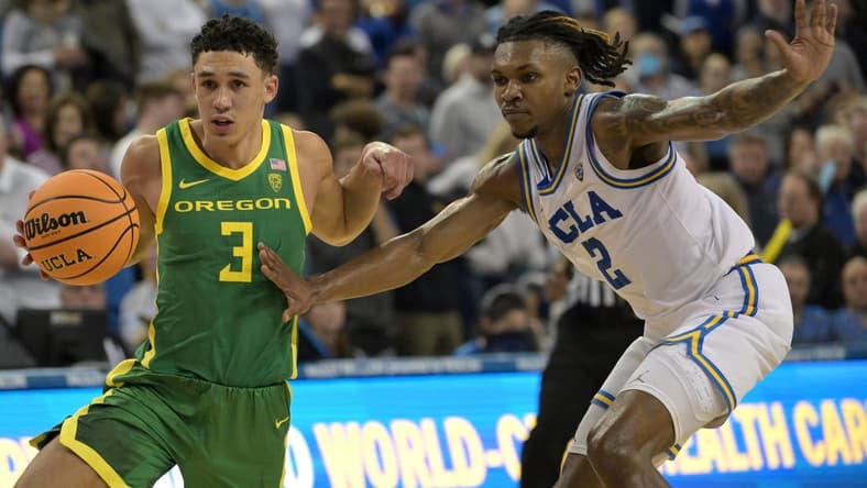 Feb 3, 2024; Los Angeles, California, USA; Oregon Ducks guard Jackson Shelstad (3) drives past UCLA Bruins guard Dylan Andrews (2) in the second half at Pauley Pavilion presented by Wescom. Mandatory Credit: Jayne Kamin-Oncea-USA TODAY Sports