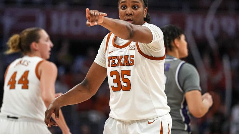 Texas Longhorns guard Madison Booker (35) directs her team during the basketball game against Kansas State at the Moody Center on Sunday, Feb. 4, 2024 in Austin.