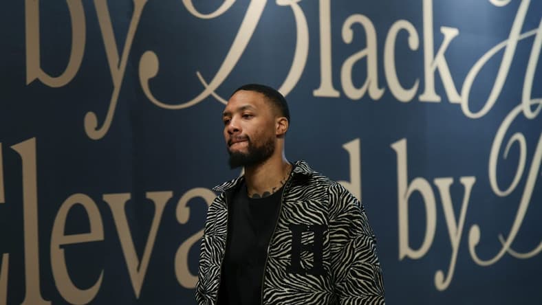 Feb 4, 2024; Salt Lake City, Utah, USA; Milwaukee Bucks guard Damian Lillard (0) arrives at the Delta Center before the game against the Utah Jazz. Mandatory Credit: Chris Nicoll-USA TODAY Sports