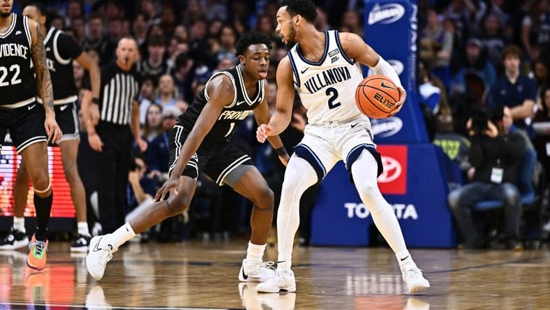 Feb 4, 2024; Philadelphia, Pennsylvania, USA; Villanova Wildcats guard Mark Armstrong (2) controls the ball against Providence Friars guard Jayden Pierre (1) in the first half at Wells Fargo Center. Mandatory Credit: Kyle Ross-USA TODAY Sports