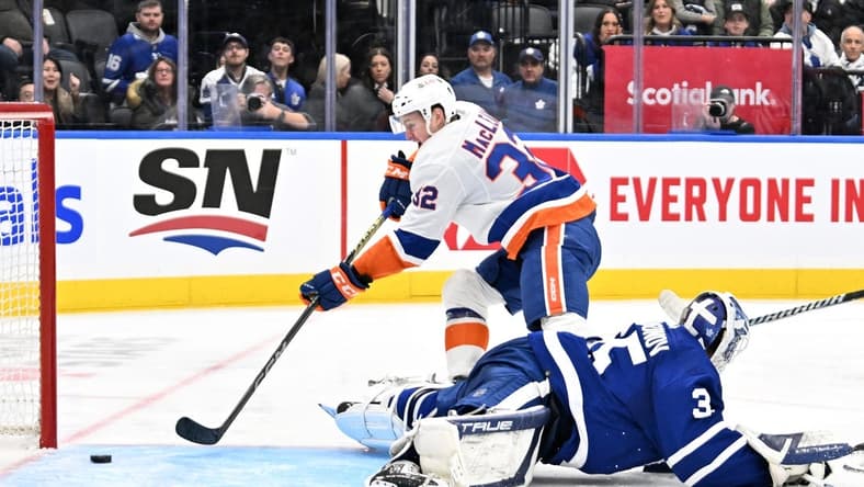 Feb 5, 2024; Toronto, Ontario, CAN;   New York Islanders forward Kyle MacLean (32) scores a goal past Toronto Maple Leafs goalie Ilya Samsonov (35) in the second period at Scotiabank Arena. Mandatory Credit: Dan Hamilton-USA TODAY Sports