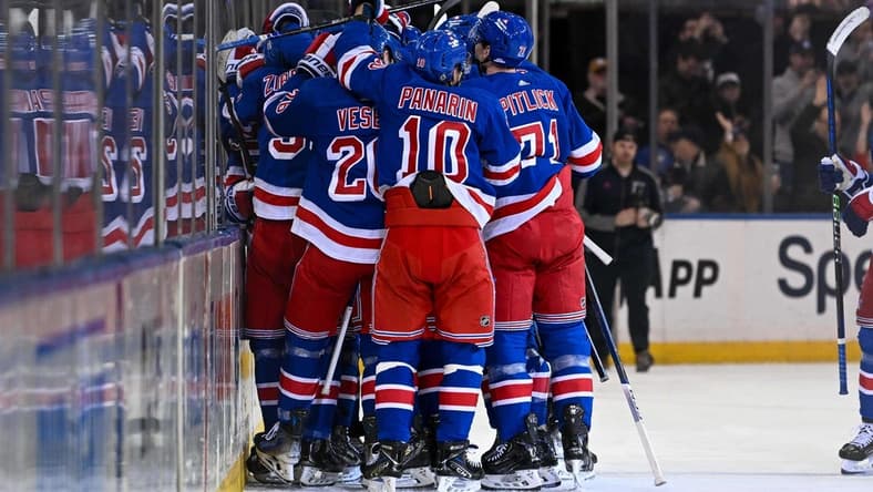 Feb 5, 2024; New York, New York, USA; New York Rangers celebrate the 2-1 victory over Colorado Avalanche after the overtime period at Madison Square Garden. Mandatory Credit: Dennis Schneidler-USA TODAY Sports