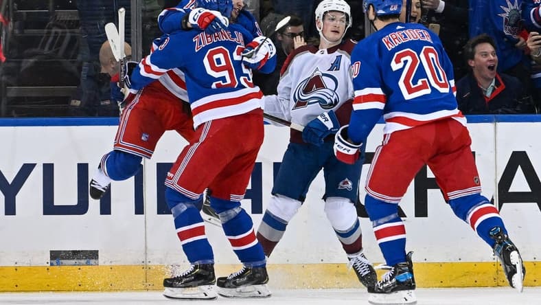 Feb 5, 2024; New York, New York, USA; New York Rangers left wing Artemi Panarin (10) celebrates his game tying goal with New York Rangers center Mika Zibanejad (93) against the Colorado Avalanche during the third period at Madison Square Garden. Mandatory Credit: Dennis Schneidler-USA TODAY Sports