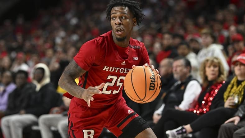 Feb 6, 2024; College Park, Maryland, USA; Rutgers Scarlet Knights guard Jeremiah Williams (25) makes a move to the basket during the first half  against the Maryland Terrapins at Xfinity Center. Mandatory Credit: Tommy Gilligan-USA TODAY Sports