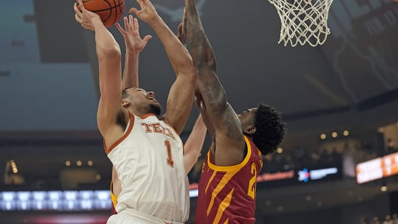 Feb 6, 2024; Austin, Texas, USA; Texas Longhorns forward Dylan Disu (1) shoots over Iowa State Cyclones forward Hason Ward (24) during the first half at Moody Center. Mandatory Credit: Scott Wachter-USA TODAY Sports