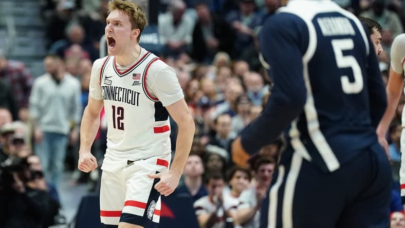 Feb 6, 2024; Hartford, Connecticut, USA; UConn Huskies guard Cam Spencer (12) reacts after his three point basket against the Butler Bulldogs in the first half at XL Center. Mandatory Credit: David Butler II-USA TODAY Sports