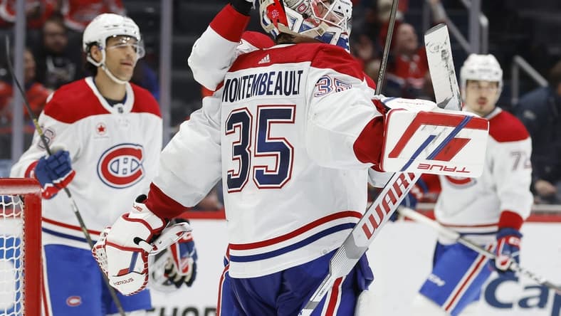 Feb 6, 2024; Washington, District of Columbia, USA; Montreal Canadiens goaltender Sam Montembeault (35) celebrates with teammates after their game against the Washington Capitals at Capital One Arena. Mandatory Credit: Geoff Burke-USA TODAY Sports