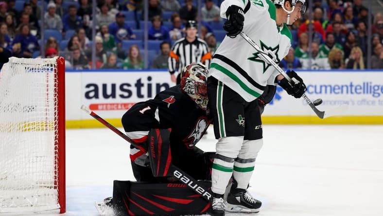 Feb 6, 2024; Buffalo, New York, USA; Dallas Stars left wing Mason Marchment (27) deflects a shot on Buffalo Sabres goaltender Ukko-Pekka Luukkonen (1) during the third period at KeyBank Center. Mandatory Credit: Timothy T. Ludwig-USA TODAY Sports