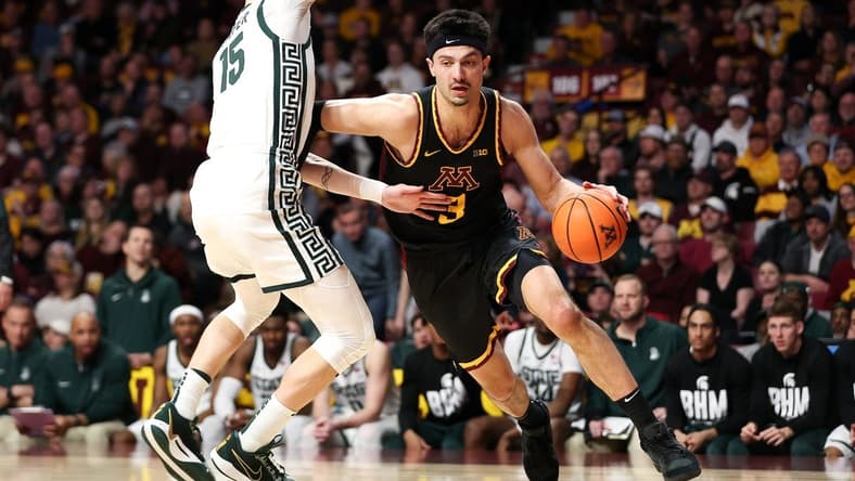 Feb 6, 2024; Minneapolis, Minnesota, USA; Minnesota Golden Gophers forward Dawson Garcia (3) works around Michigan State Spartans center Carson Cooper (15) during the first half at Williams Arena. Mandatory Credit: Matt Krohn-USA TODAY Sports