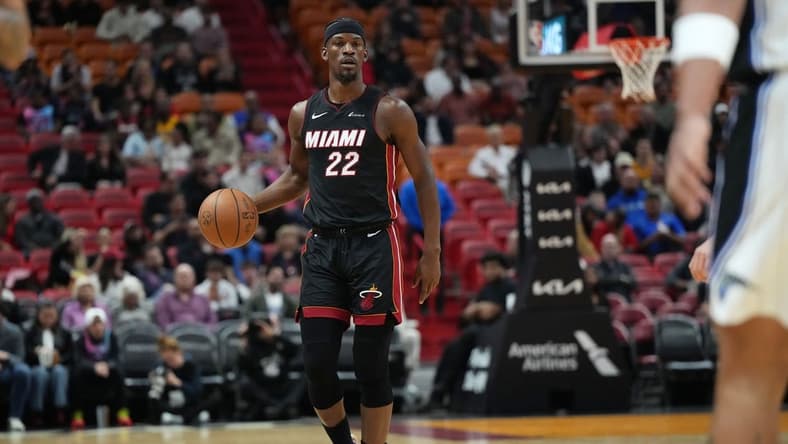 Feb 6, 2024; Miami, Florida, USA; Miami Heat forward Jimmy Butler (22) brings the ball up the court against the Orlando Magic during the first half at Kaseya Center. Mandatory Credit: Jim Rassol-USA TODAY Sports