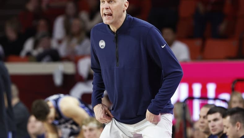 Feb 6, 2024; Norman, Oklahoma, USA; Brigham Young Cougars head coach Mark Pope yells to his team on a play against the Oklahoma Sooners during the second half at Lloyd Noble Center. Mandatory Credit: Alonzo Adams-USA TODAY Sports