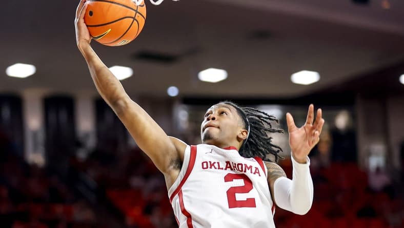 Oklahoma guard Javian McCollum (2) lays up the ball in the second half during an NCAA basketball game between University of Oklahoma (OU) and Brigham Young University (BYU) at Lloyd Noble Center in Norman, Okla., on Tuesday, Feb. 6, 2024.