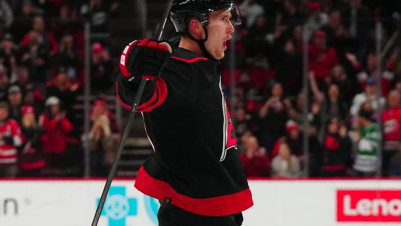 Feb 8, 2024; Raleigh, North Carolina, USA; Carolina Hurricanes center Martin Necas (88) scores a goal against the Colorado Avalanche during the first period at PNC Arena. Mandatory Credit: James Guillory-USA TODAY Sports