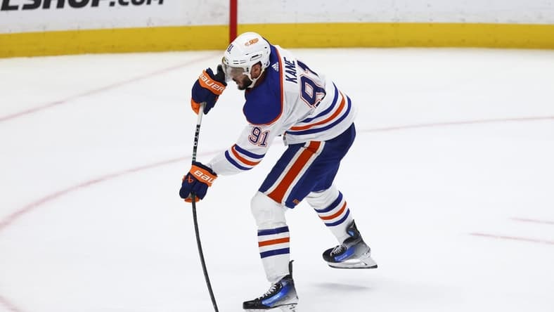 Feb 9, 2024; Anaheim, California, USA; Edmonton Oilers left wing Evander Kane (91) scores a goal during the third period of a game against the Anaheim Ducks at Honda Center. Mandatory Credit: Jessica Alcheh-USA TODAY Sports