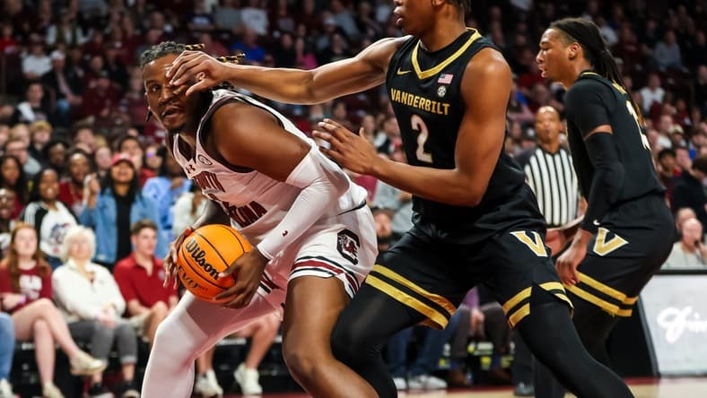Feb 10, 2024; Columbia, South Carolina, USA; South Carolina Gamecocks forward B.J. Mack (2) looks to get around Vanderbilt Commodores forward Ven-Allen Lubin (2) in the first half at Colonial Life Arena. Mandatory Credit: Jeff Blake-USA TODAY Sports
