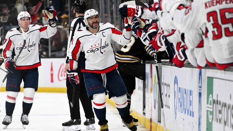 Feb 10, 2024; Boston, Massachusetts, USA; Washington Capitals left wing Alex Ovechkin (8) celebrates with his teammates after scoring a goal against the Boston Bruins during the third period at the TD Garden. Mandatory Credit: Brian Fluharty-USA TODAY Sports