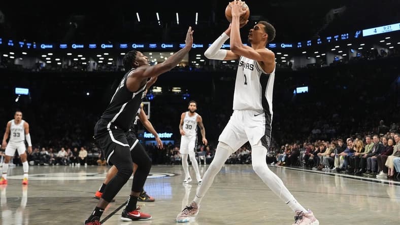 Feb 10, 2024; Brooklyn, New York, USA; San Antonio Spurs center Victor Wembanyama (1) shoots a jump shot against the Brooklyn Nets during the first quarter at Barclays Center. Mandatory Credit: Gregory Fisher-USA TODAY Sports