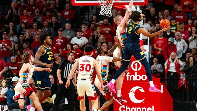 Feb 10, 2024; Lincoln, Nebraska, USA; Michigan Wolverines forward Tray Jackson (2) is blocked by Nebraska Cornhuskers forward Rienk Mast (51) during the first half at Pinnacle Bank Arena. Mandatory Credit: Dylan Widger-USA TODAY Sports