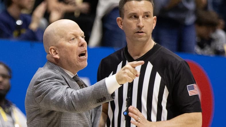 Feb 10, 2024; Berkeley, California, USA; UCLA Bruins head coach Mick Cronin (left) argues a call with a referee during the second half against the California Golden Bears at Haas Pavilion. Mandatory Credit: D. Ross Cameron-USA TODAY Sports