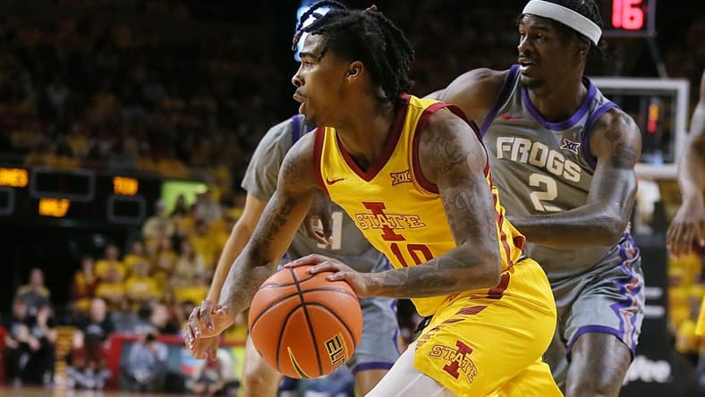 Iowa State Cyclones guard Keshon Gilbert (10) drives around TCU Horned Frogs forward Emanuel Miller (2) during the first half in the Big-12 conference showdown of a NCAA college basketball at Hilton Coliseum on Saturday, Feb. 10, 2024, in Ames, Iowa.