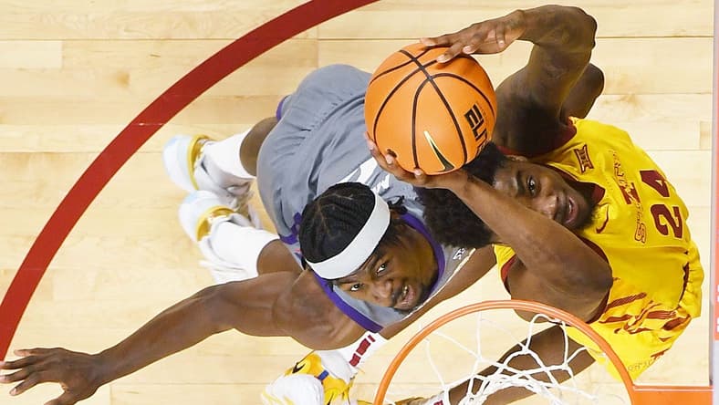 Iowa State Cyclones forward Hason Ward (24) takes a shot around TCU Horned Frogs forward Emanuel Miller (2) during the first half in the Big-12 conference showdown of a NCAA college basketball at Hilton Coliseum on Saturday, Feb. 10, 2024, in Ames, Iowa.